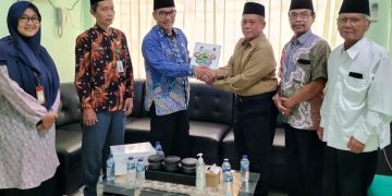 Penyerahan LPJ Penerimaan dan Pentasarufan Zakat Baznas Kab. Kudus melalui UPZ Kankemenag Kab. Kudus