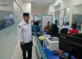 Seksi PHU Kankemenag Kab. Kudus Dampingi Pengurusan Paspor Calon Jemaah Haji 1446 H/2025 M.